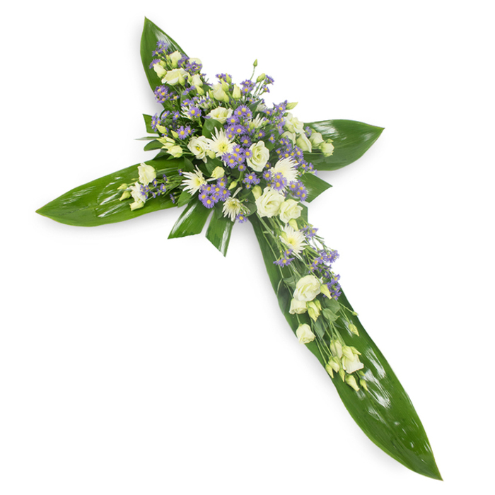 In this serene portrait of mourning, the floral cross floats on a white field, photographed from a modest overhead angle that celebrates both form and feeling. The foundation is composed of broad, shining green leaves-tropical in character and arranged to carve the clean lines of the cross-their waxy surfaces and prominent veins catching a diffuse, even light that gives the piece a subtle inner glow. At the heart and along the arms, clusters of soft white and creamy lisianthus unfold like quiet breaths, their ruffled petals and sealed buds offering a sense of gentle renewal. Interspersed are small, white, daisy-like chrysanthemums that add luminous punctuation, while fine sprays of lavender-toned limonium or petite asters weave cool, starry notes through the composition. Wisps of delicate green filler foliage thread through the flowers, creating depth and the suggestion of movement as if a calm breeze had passed. The tactile contrast-the slick, protective leaves against the fragile, cloud-like blooms-speaks to the balance of strength and tenderness in grief. This arrangement reads as a classic sympathy tribute, suitable for memorial services around Bracknell town centre, for gatherings in spaces near Lily Hill Park or community halls in Jennett's Park and Warfield. It carries a quiet, contemplative scent and an atmosphere of reverent consolation, crafted to embody dignity, faith, and lasting remembrance for those who wish to offer solace.